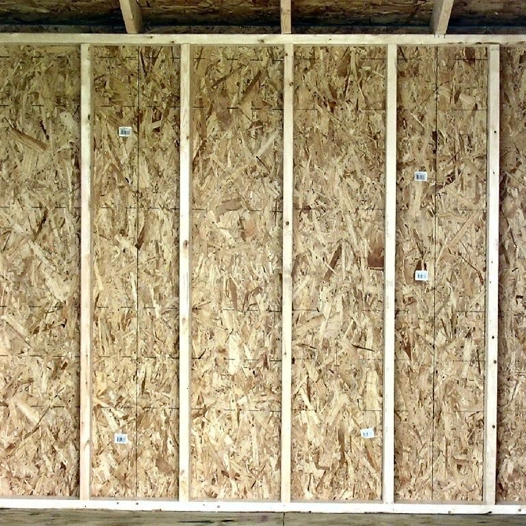 A wall of wood with some type of wooden frame.